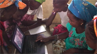 African kids around computer