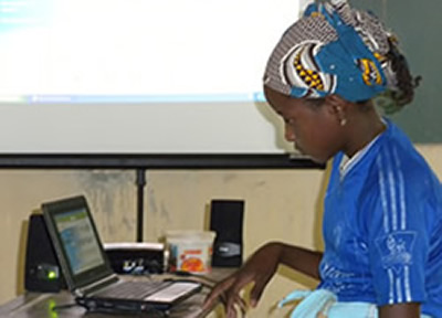 Girl with laptop and projector
