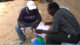 The director and one of the teachers work with us to create a schedule for the upcoming weeks.