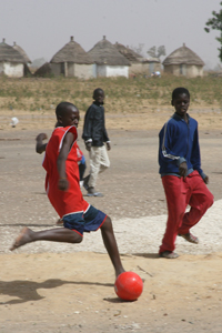 Children playing soccer
